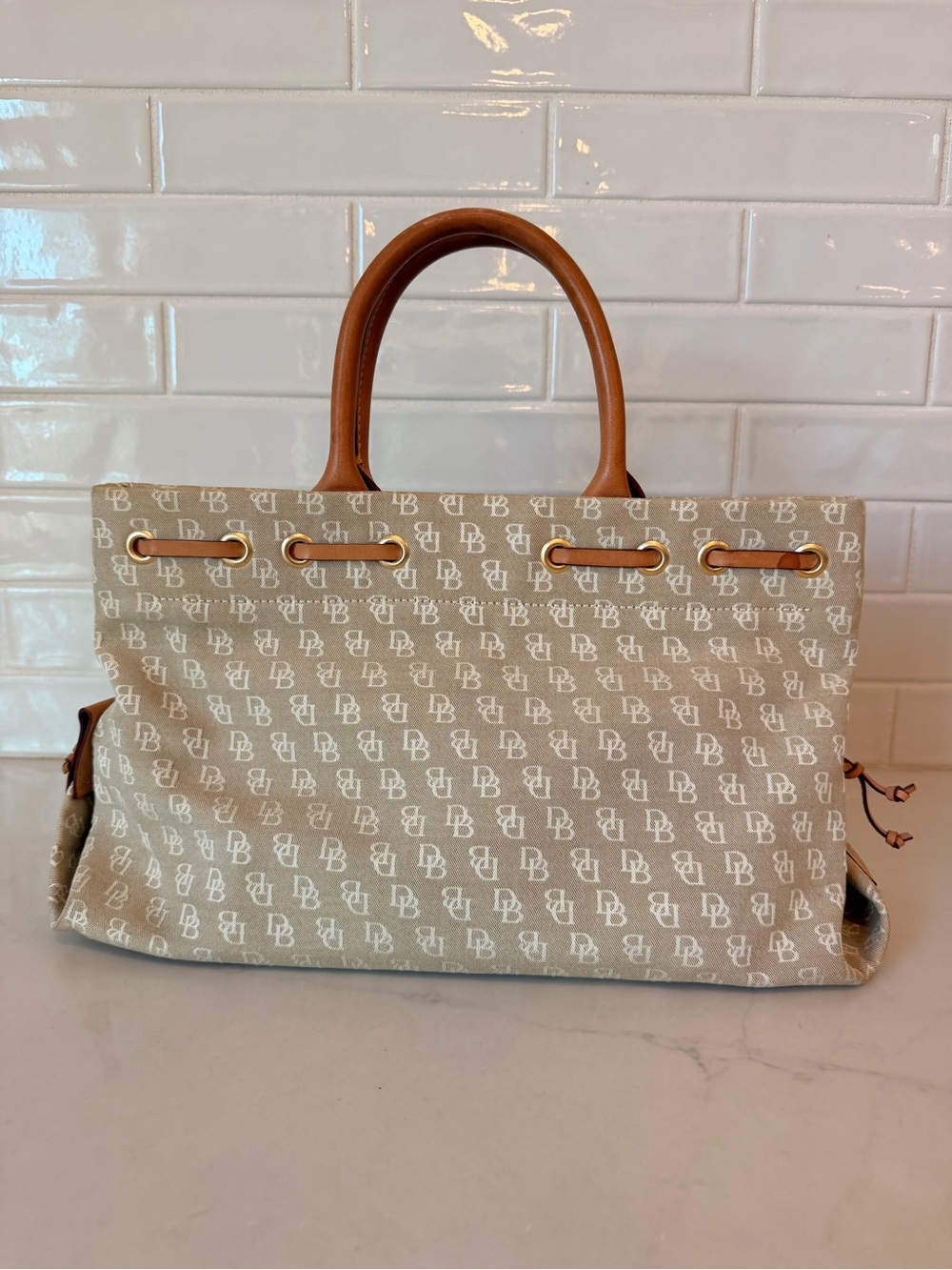 Dooney & Bourke tassel tote with brown leather handles - Picture 2 of 12